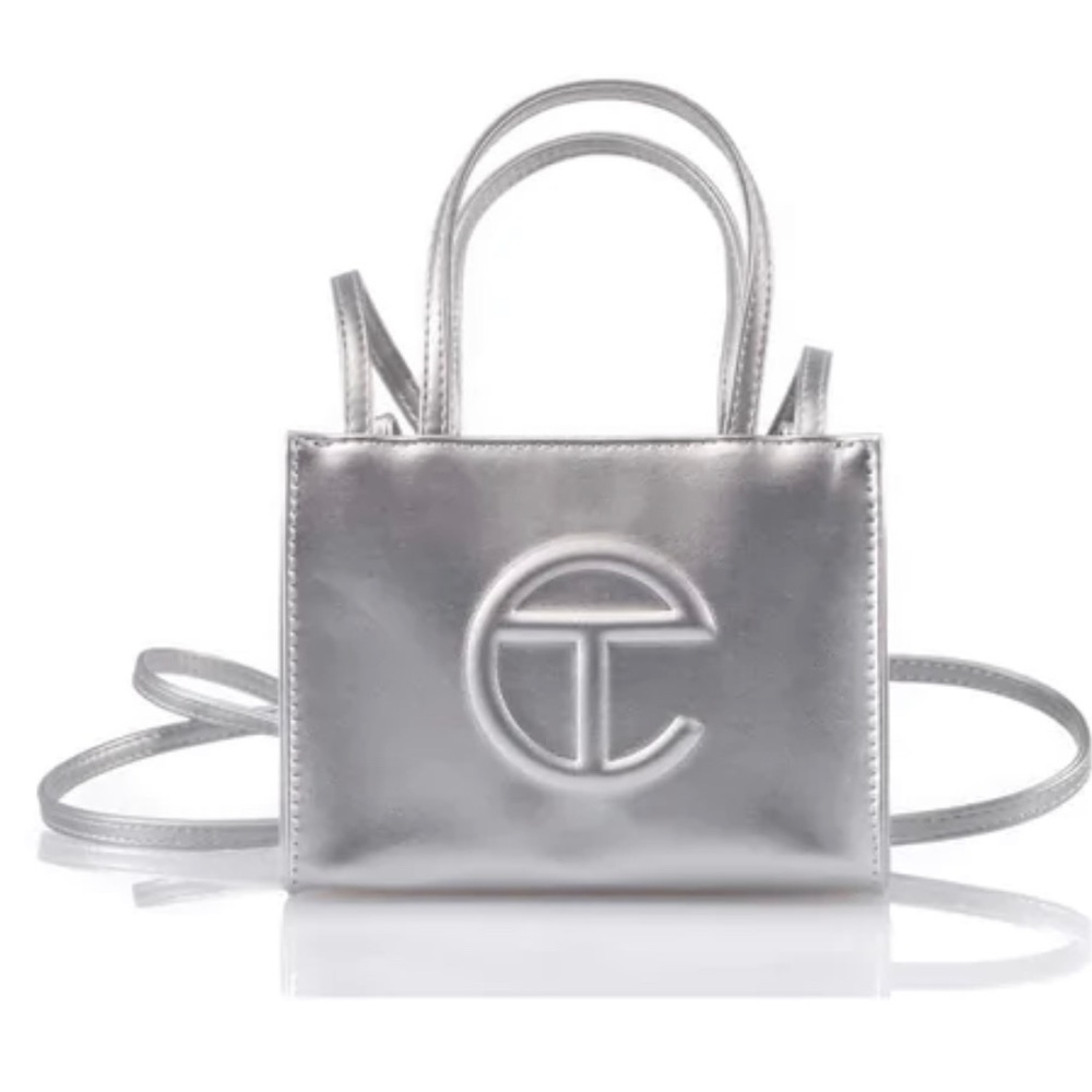 USED AUTHENTIC silver telfar bag